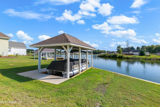 dock area featuring a water view and a lawn