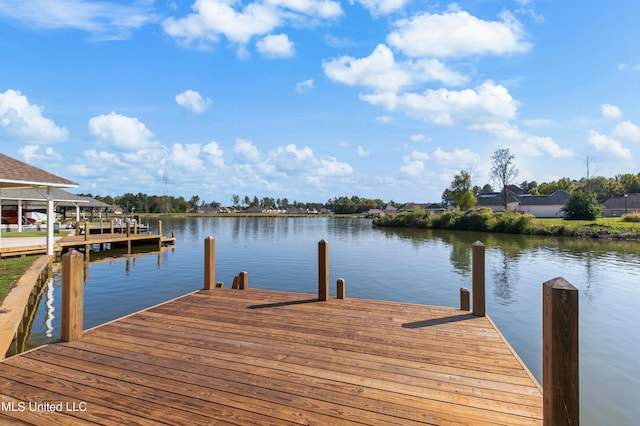 view of dock with a water view