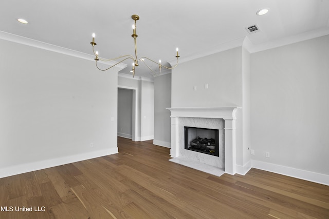 126 Herons Bay Cir Lot 1136, Madison, MS 39110 - unfurnished living room with wood finished floors, recessed lighting, a chandelier, and crown molding