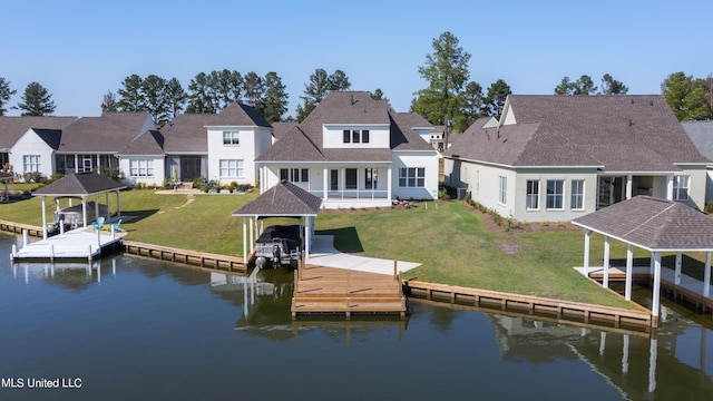 126 Herons Bay Cir Lot 1136, Madison, MS 39110 - dock area with a water view and a yard