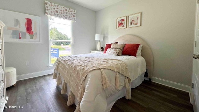 bedroom featuring dark hardwood / wood-style floors