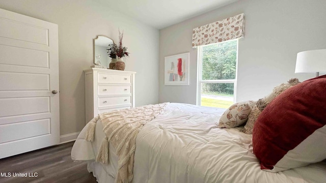 bedroom featuring dark hardwood / wood-style floors