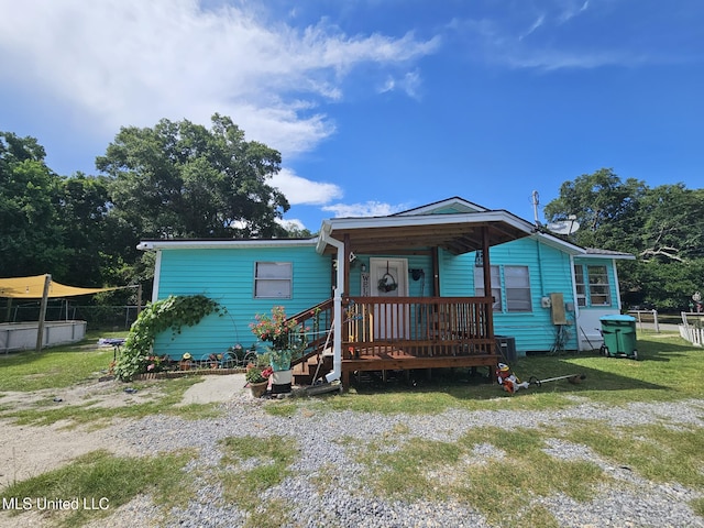 2305 Roberts Ave, Gulfport, MS 39501 - manufactured / mobile home featuring a front lawn and covered porch