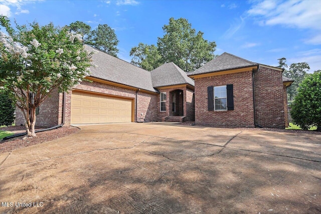 306 Canebreak Cv, Madison, MS 39110 - view of front of home featuring brick siding, driveway, and an attached garage