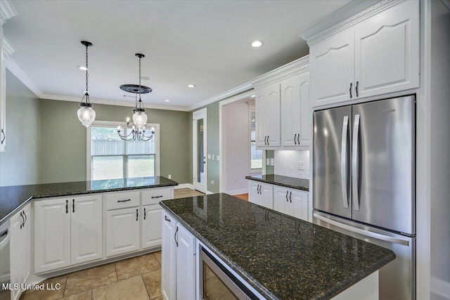 306 Canebreak Cv, Madison, MS 39110 - kitchen with appliances with stainless steel finishes, ornamental molding, white cabinetry, a chandelier, and recessed lighting