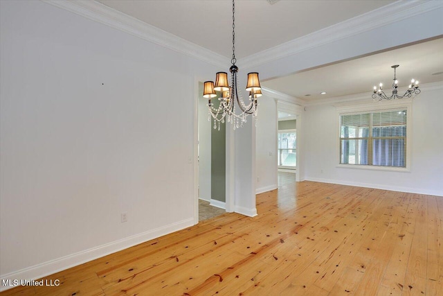 306 Canebreak Cv, Madison, MS 39110 - spare room featuring a chandelier, light wood-type flooring, ornamental molding, and baseboards