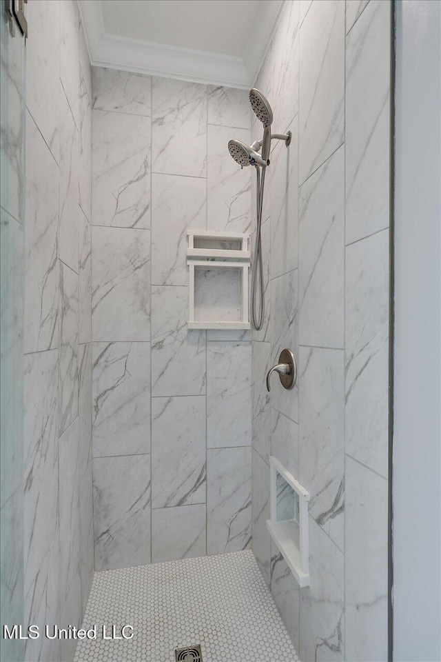 306 Canebreak Cv, Madison, MS 39110 - full bathroom with ornamental molding and a tile shower