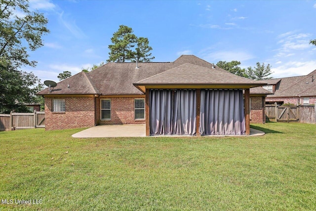 306 Canebreak Cv, Madison, MS 39110 - back of house with brick siding, a patio area, a gate, and roof with shingles
