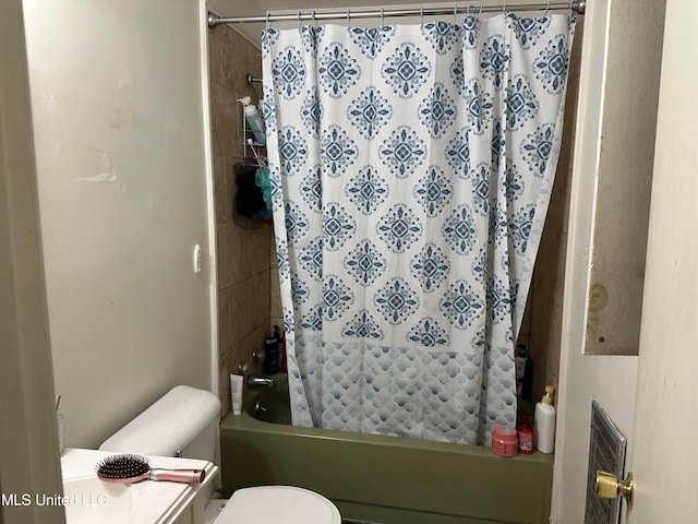 bathroom featuring toilet and shower / bathtub combination with curtain