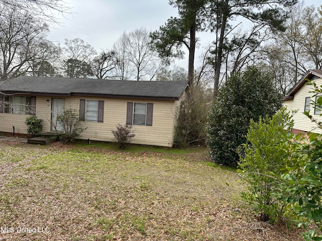 view of property exterior featuring a yard