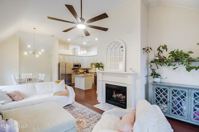 living room featuring high vaulted ceiling, ornamental molding, dark hardwood / wood-style flooring, and ceiling fan with notable chandelier