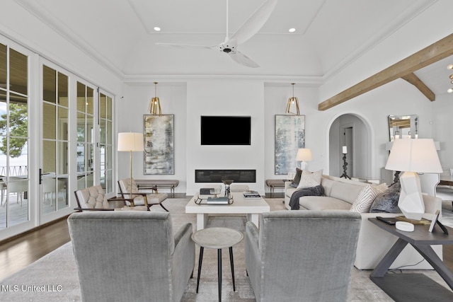 150 Old Trace Rd, Madison, MS 39110 - living area featuring arched walkways, a glass covered fireplace, ceiling fan, recessed lighting, and wood finished floors
