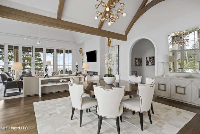 150 Old Trace Rd, Madison, MS 39110 - dining room with a chandelier, wood finished floors, beam ceiling, arched walkways, and high vaulted ceiling
