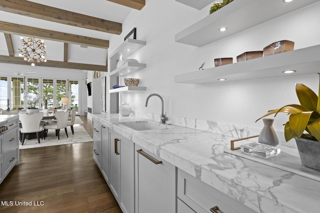 150 Old Trace Rd, Madison, MS 39110 - kitchen featuring open shelves, beam ceiling, light stone counters, recessed lighting, and dark wood-type flooring