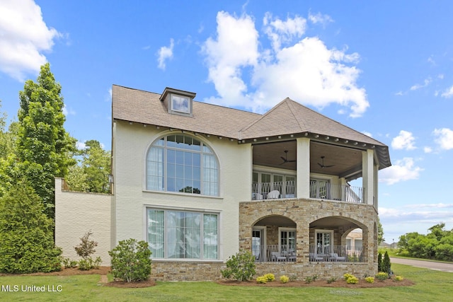 150 Old Trace Rd, Madison, MS 39110 - view of front of house featuring a balcony, a front yard, stone siding, a porch, and brick siding