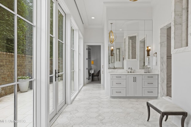 150 Old Trace Rd, Madison, MS 39110 - bathroom with vanity, ornamental molding, and a chandelier