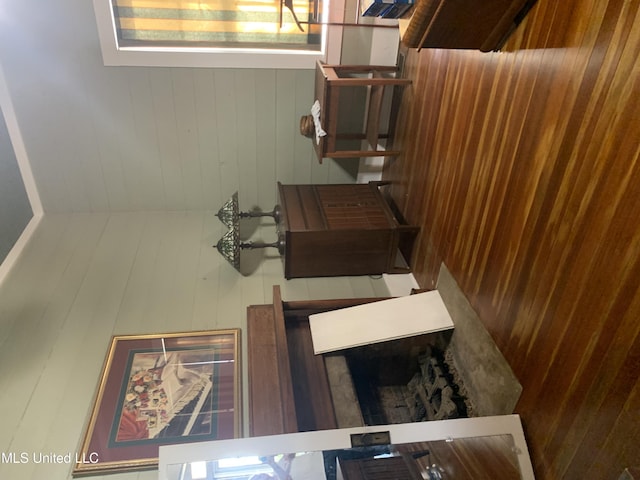 dining area with wood walls