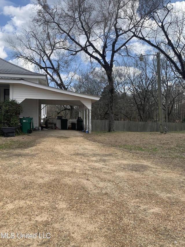 view of yard featuring a carport