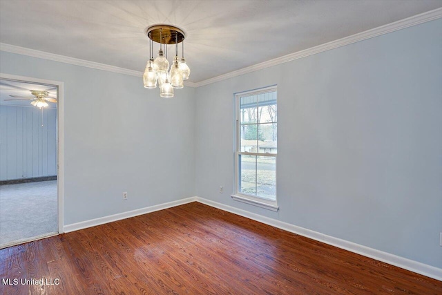 unfurnished room featuring hardwood / wood-style floors, crown molding, and ceiling fan with notable chandelier