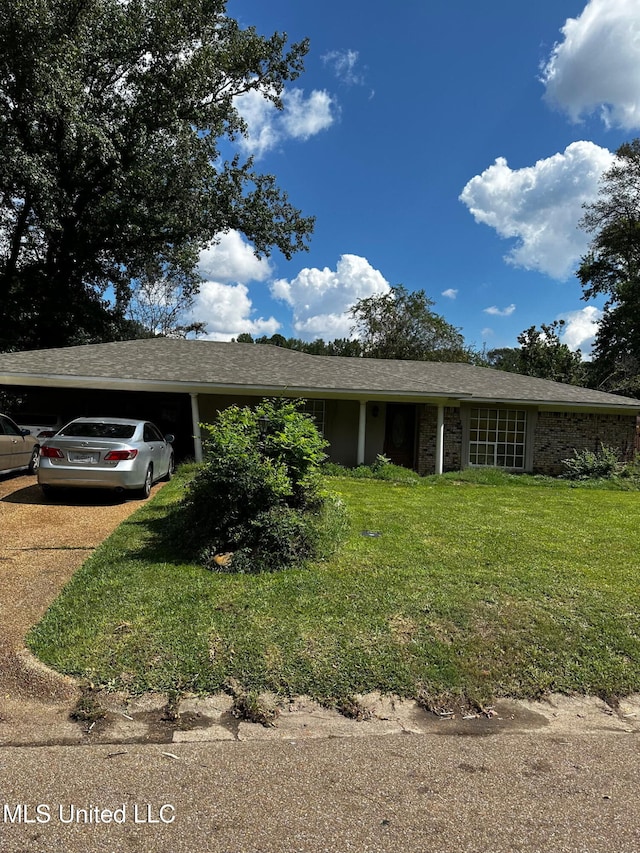 4668 Norway Dr, Jackson, MS 39206 - ranch-style house with an attached garage, a front lawn, and concrete driveway