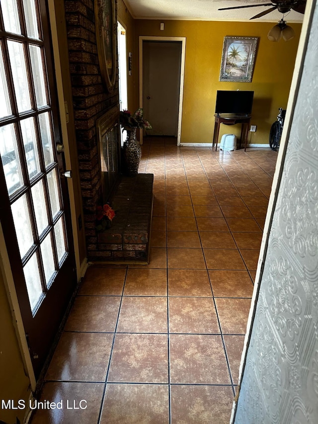 4668 Norway Dr, Jackson, MS 39206 - hall featuring tile patterned floors, healthy amount of natural light, and baseboards
