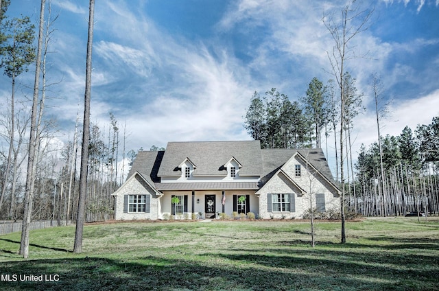 view of front of home featuring a front lawn and a porch