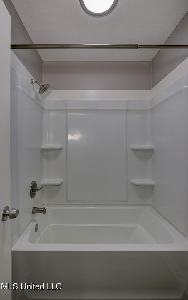 full bath featuring walk in shower