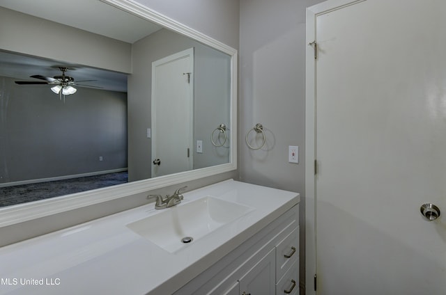 bathroom with a ceiling fan and vanity