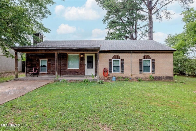 2880 Briarwood Dr, Horn Lake, MS 38637 - ranch-style house with a chimney, a front yard, roof with shingles, and brick siding