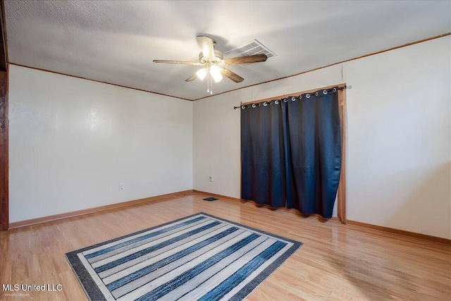 2880 Briarwood Dr, Horn Lake, MS 38637 - spare room with light wood finished floors and a ceiling fan