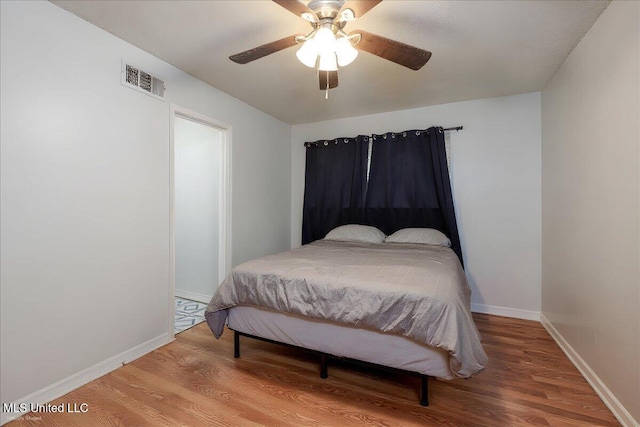 2880 Briarwood Dr, Horn Lake, MS 38637 - bedroom featuring wood finished floors and ceiling fan