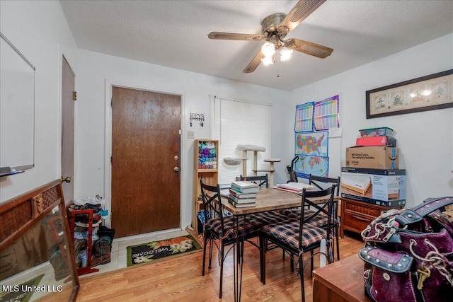 2880 Briarwood Dr, Horn Lake, MS 38637 - dining space with ceiling fan and wood finished floors