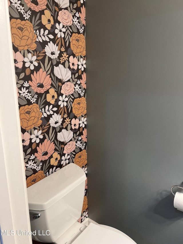 bathroom featuring toilet