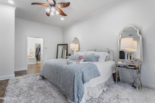 bedroom featuring ceiling fan and crown molding