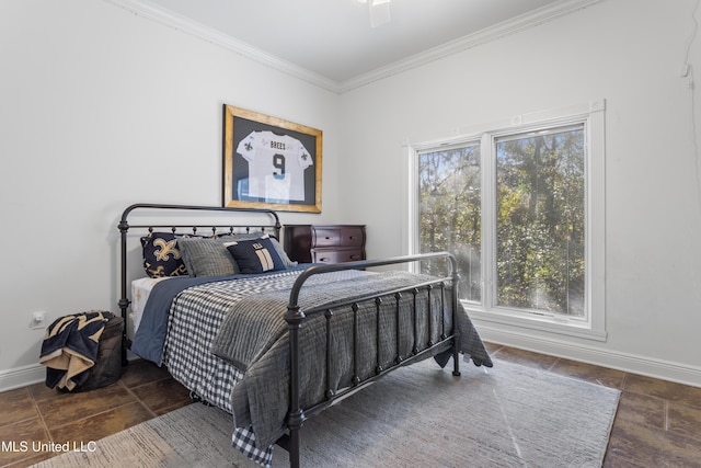 bedroom with multiple windows, ceiling fan, and ornamental molding