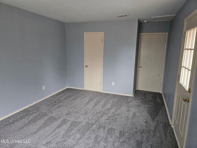 1074 Windrose Dr, Brandon, MS 39047 - unfurnished bedroom with carpet flooring, baseboards, and attic access