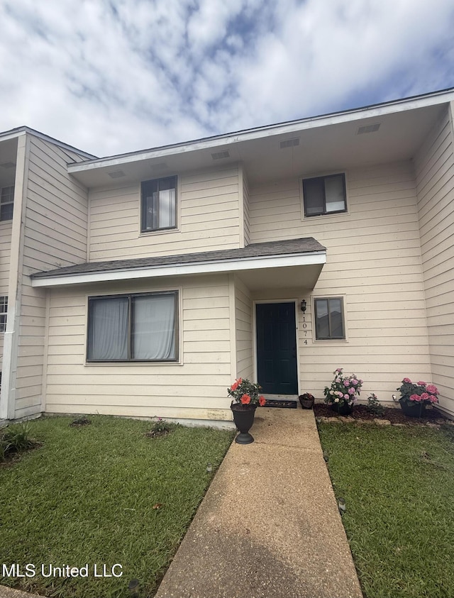 1074 Windrose Dr, Brandon, MS 39047 - view of front facade with a front lawn