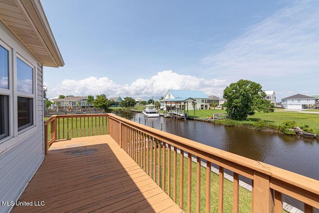 11088 Tahiti St, Bay Saint Louis, MS 39520 - wooden deck with a water view, a yard, and a residential view