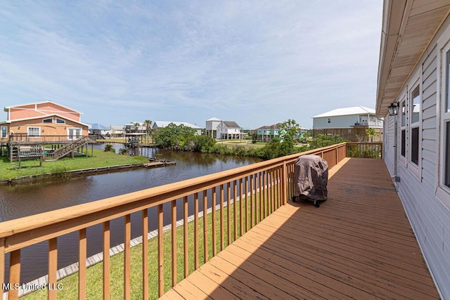 11088 Tahiti St, Bay Saint Louis, MS 39520 - wooden terrace featuring a residential view and a water view