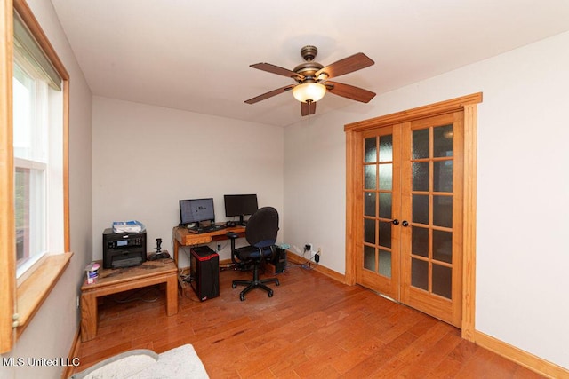 11088 Tahiti St, Bay Saint Louis, MS 39520 - office space with french doors, light wood finished floors, baseboards, and a ceiling fan