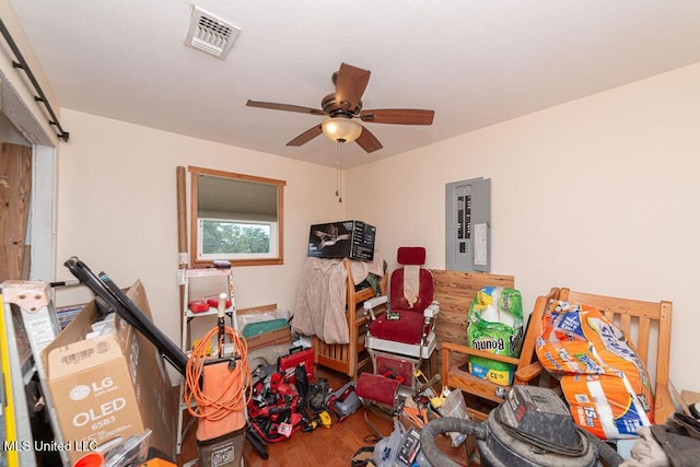 11088 Tahiti St, Bay Saint Louis, MS 39520 - playroom featuring electric panel, wood finished floors, and a ceiling fan