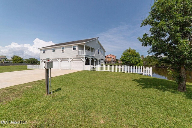11088 Tahiti St, Bay Saint Louis, MS 39520 - coastal inspired home featuring a garage and driveway