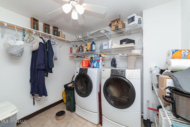 11088 Tahiti St, Bay Saint Louis, MS 39520 - washroom with independent washer and dryer, ceiling fan, light tile patterned flooring, and baseboards