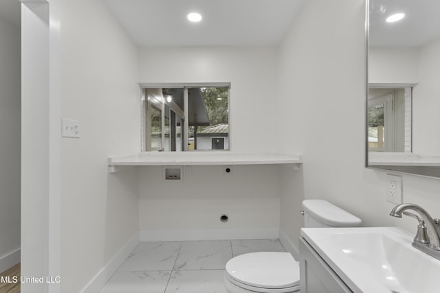 175 Saint Charles Ave, Biloxi, MS 39530 - bathroom with marble finish floors, recessed lighting, and vanity