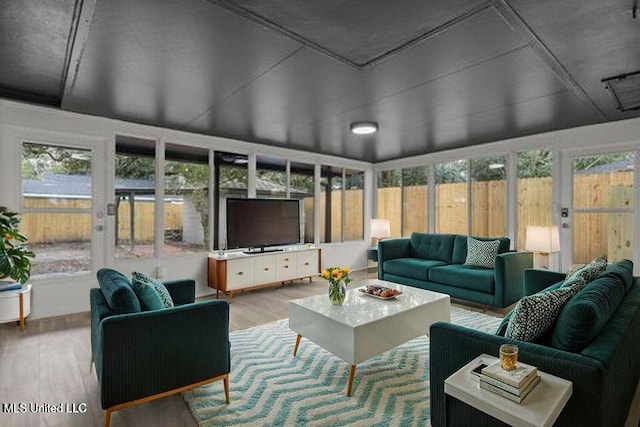 175 Saint Charles Ave, Biloxi, MS 39530 - sunroom with wood finished floors and plenty of natural light