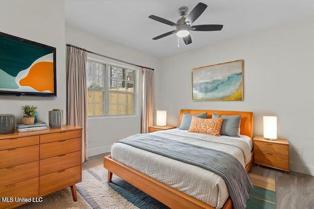 175 Saint Charles Ave, Biloxi, MS 39530 - bedroom with light wood-type flooring and ceiling fan