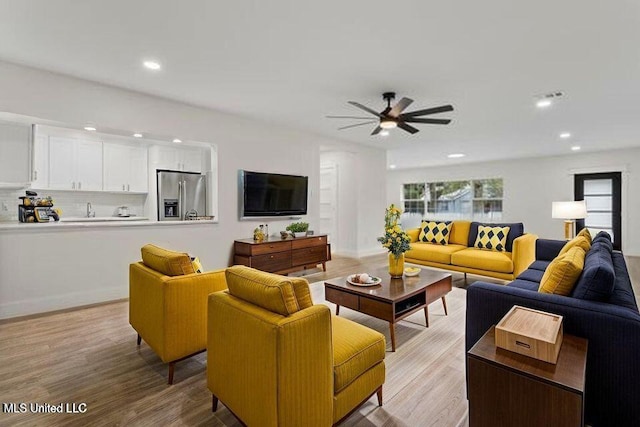 175 Saint Charles Ave, Biloxi, MS 39530 - living area with light wood-style flooring, a ceiling fan, and recessed lighting