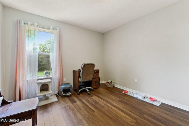 14174 Spruce Ct, Gulfport, MS 39503 - home office with wood finished floors and baseboards