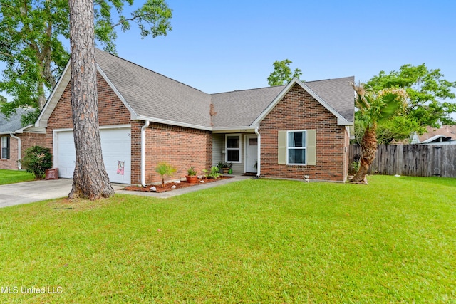 14174 Spruce Ct, Gulfport, MS 39503 - view of front of house with an attached garage, a shingled roof, brick siding, and concrete driveway