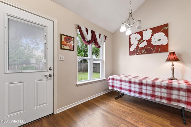 14174 Spruce Ct, Gulfport, MS 39503 - bedroom with wood finished floors, lofted ceiling, and baseboards